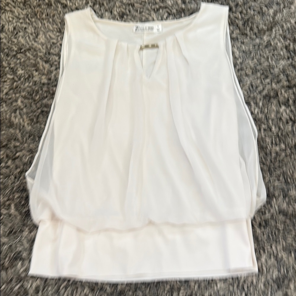 White Sleeveless Blouse